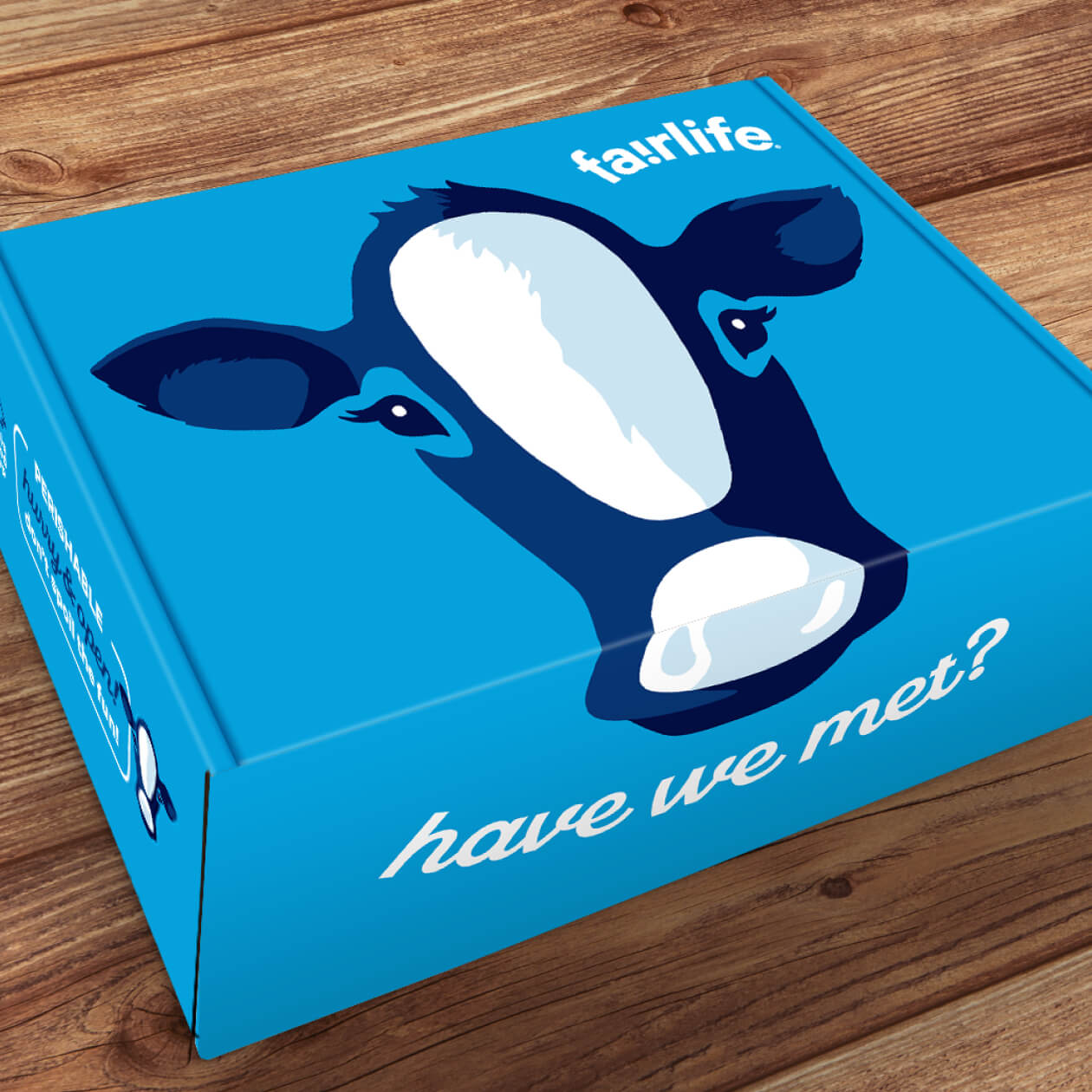 fairlife blue Press Kit with cow head on brown wood background